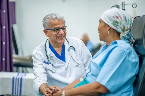 photo of doctor with oncology patient